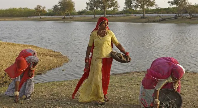 Rural women working near a water source